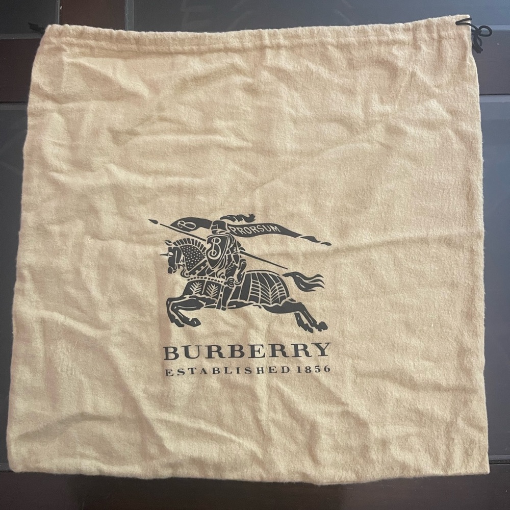 A brand new Burberry dust bag in medium size.